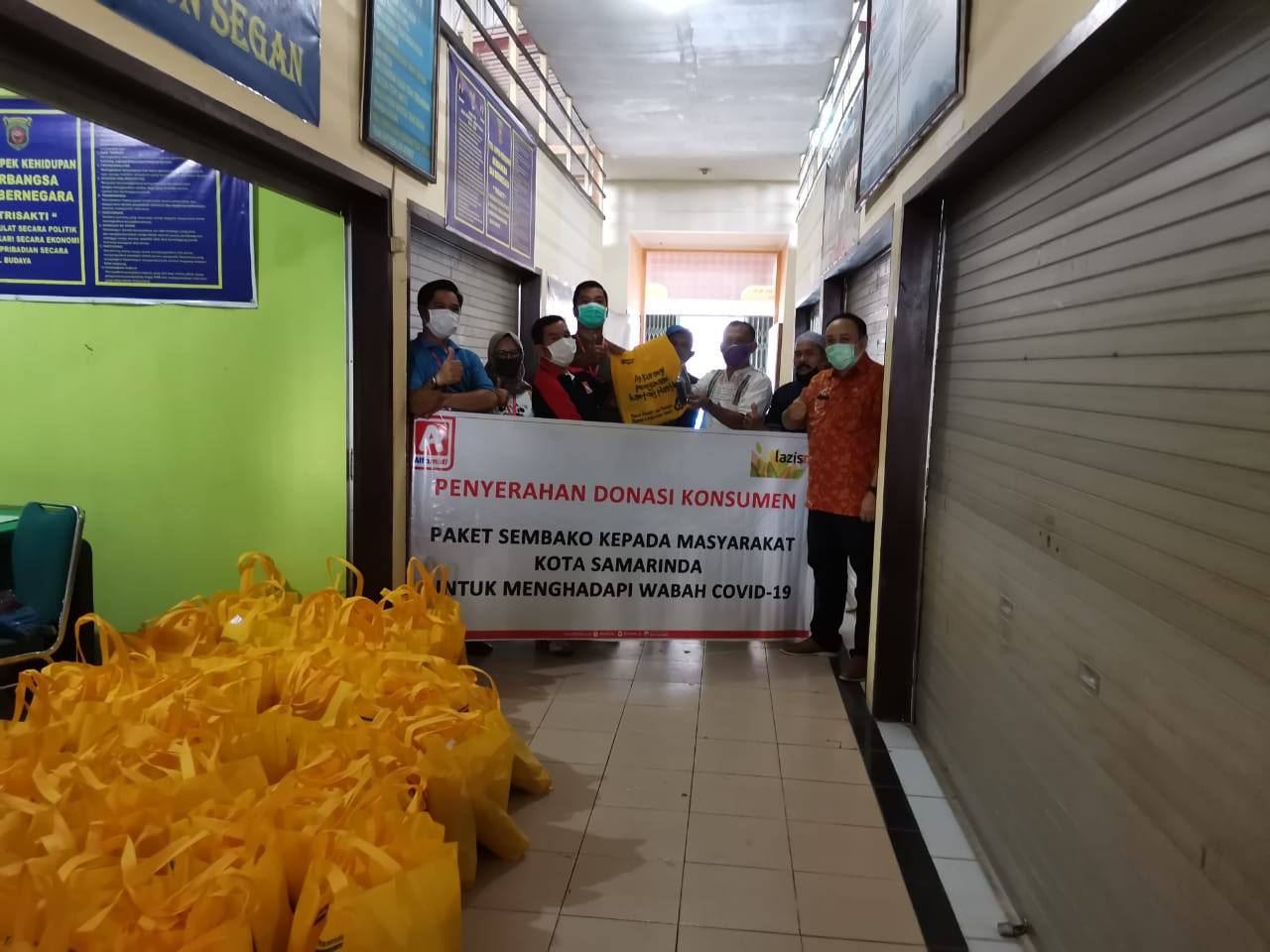 Lazismu Alfamidi Salurkan 75 Paket Sembako ke Disperindag Samarinda