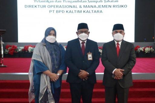 Muhammad Erwin (tengah) bersama Gubernur Kaltim, Isran Noor. (Foto: Pemprov Kaltim)