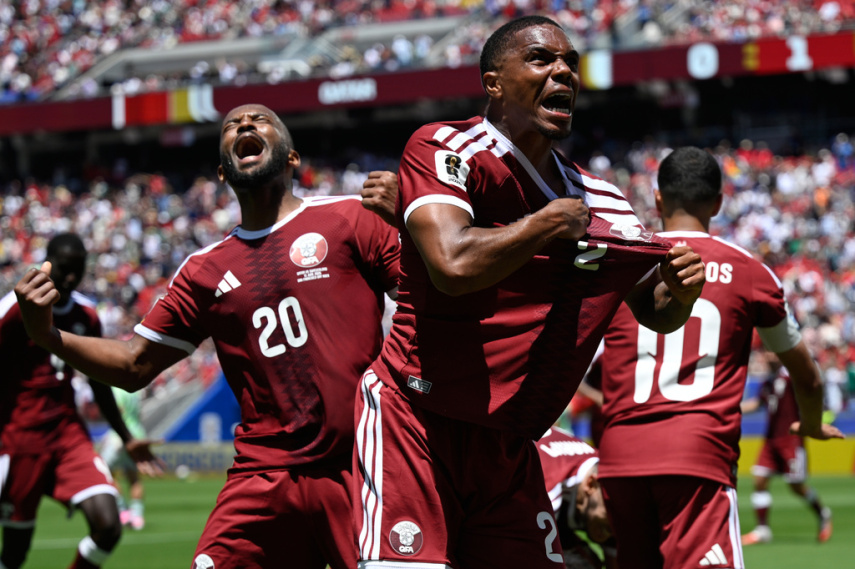 Boualem Khoukhi's goal on header in stoppage time earns Qatar a 1-1 World Cup draw with Switzerland